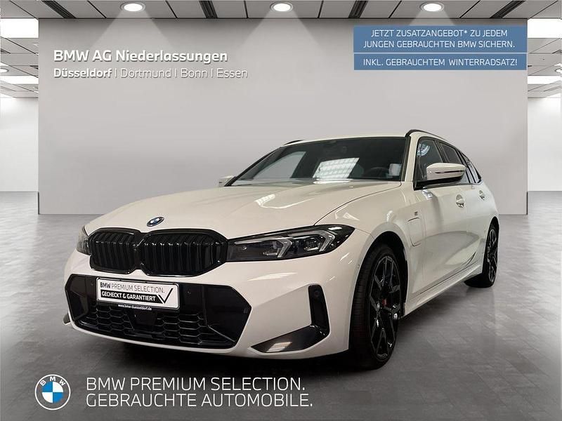 Weiß Gebraucht 2024 BMW 330e M Sport Kombi | 55.999 € - Bild 1/2