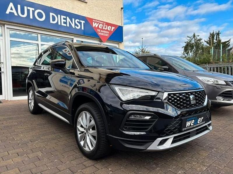 Black magic (metallic) Gebraucht 2024 Seat Ateca SUV | 27.970 € (Fairer Preis) - Bild 1/4