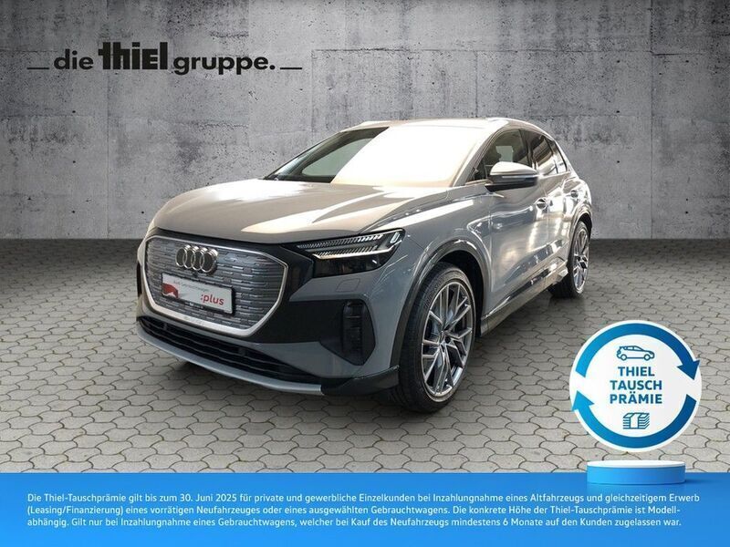 Grau Gebraucht 2021 Audi Q4 e-tron Comfort SUV | 29.850 € (Teuer) - Bild 1/4