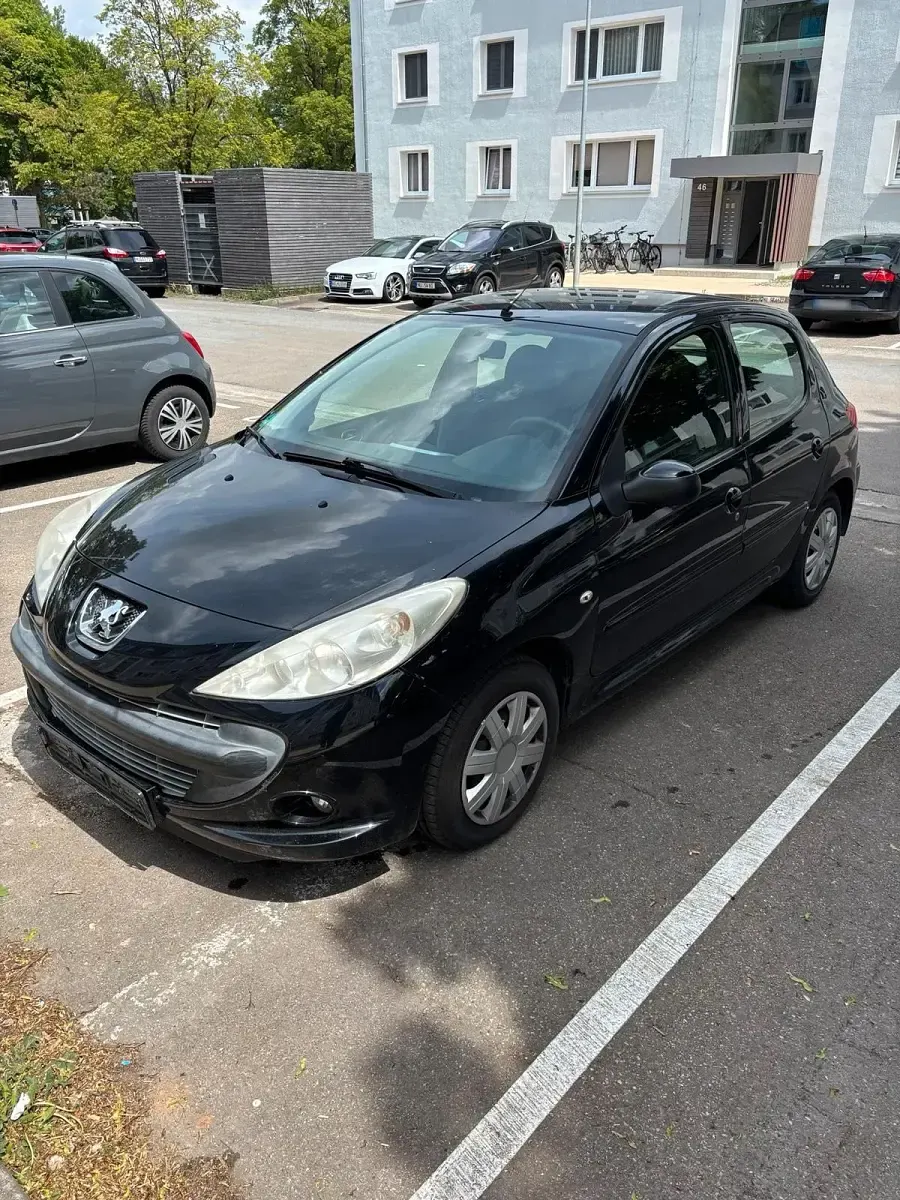 Gebraucht Peugeot 206 73 PS (53 kW) 2011 Schwarz Kleinwagen