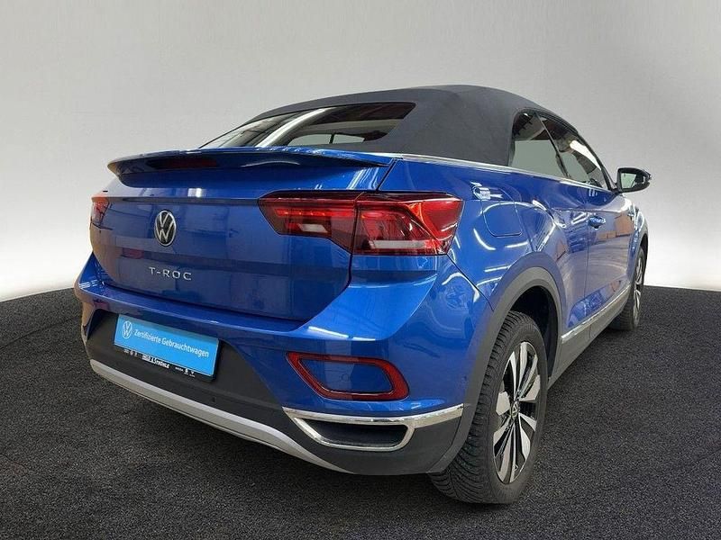Gebraucht VW T-Roc Cabriolet Move 116 PS (85 kW) 2024 Ravennablau metallic/schwarz Cabrio