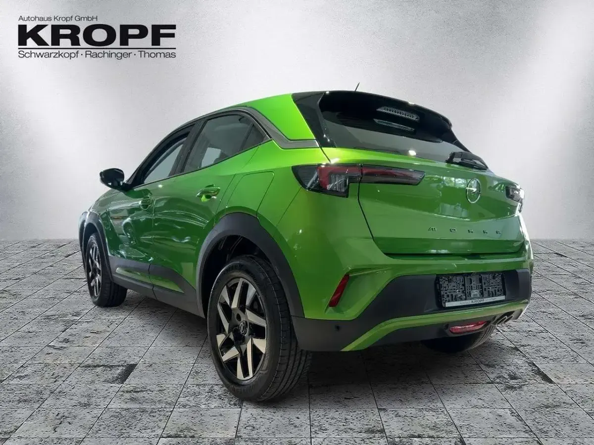 Gebraucht Opel Mokka Elegance 131 PS (96 kW) 2024 Lackierung matcha green/typ au SUV