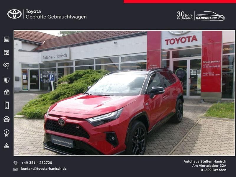 Karminarot metallic / dach sch Gebraucht 2024 Toyota RAV4 Hybrid Sport SUV | 53.990 € (Teuer) - Bild 1/4