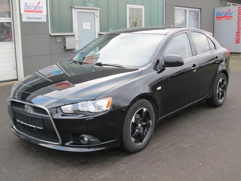 Schwarz Gebraucht 2012 Mitsubishi Lancer Limousine | 4.950 € (Fairer Preis) - Bild 1/4