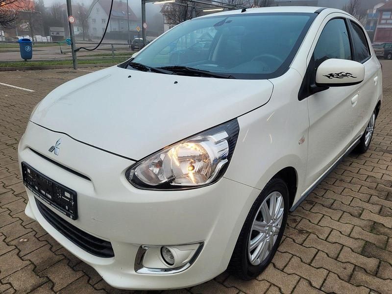 Weiß Gebraucht 2013 Mitsubishi Space Star Top Kleinwagen | 3.897 € (Fairer Preis) - Bild 1/4