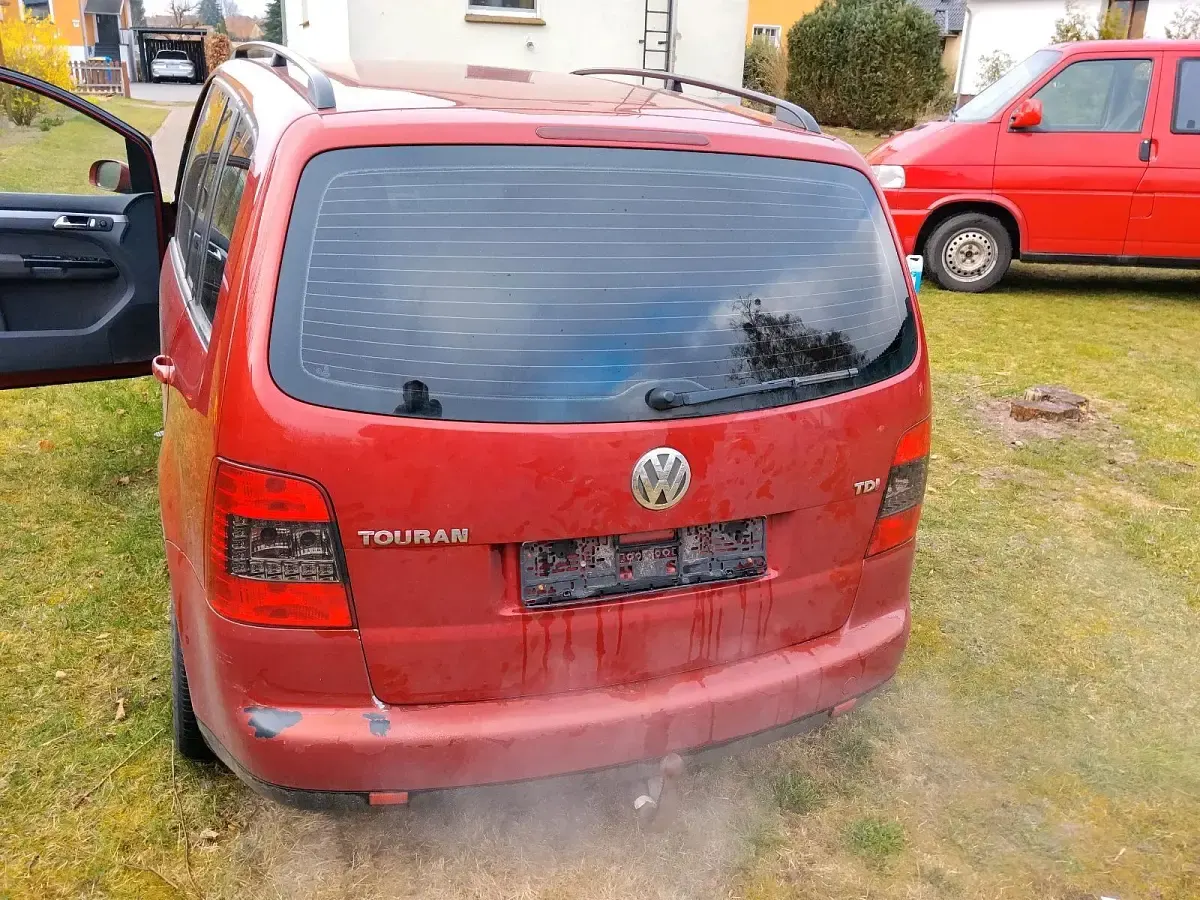 Używany VW Touran 101 KM (74 kW) 2003 Czerwony Minivan