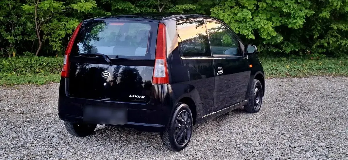 Gebraucht Daihatsu Cuore 43 PS (31 kW) 2005 Schwarz Kleinwagen