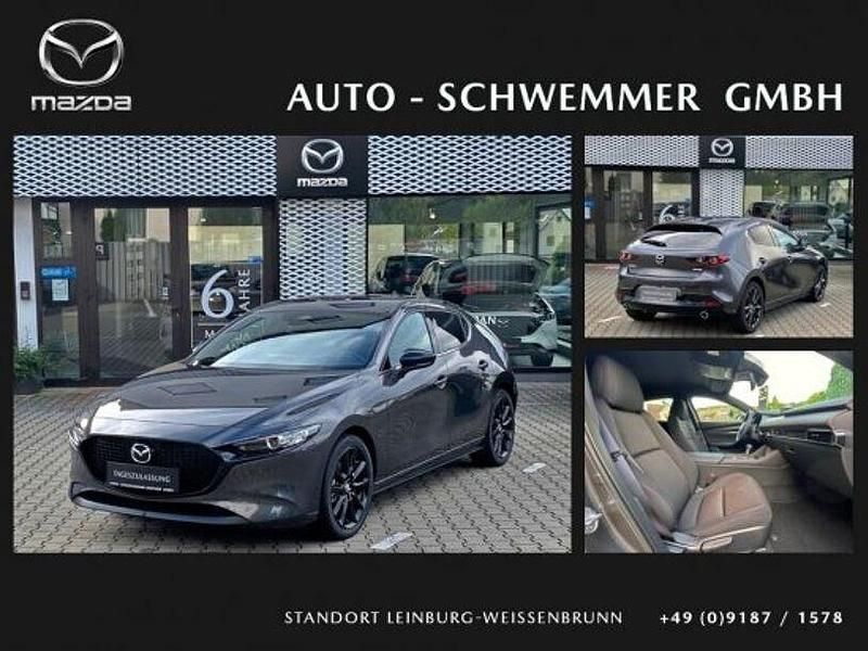 Machine gray (metallic) Gebraucht 2024 Mazda 3 Homura-Line Limousine | 22.990 € (Guter Preis) - Bild 1/4
