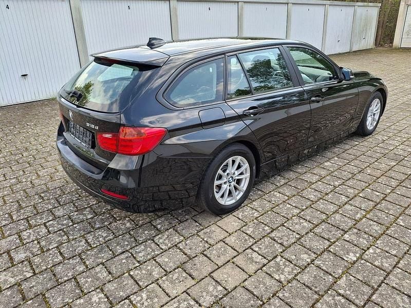 Second-hand BMW 318 143 CP (105 kW) 2012 Negru Break