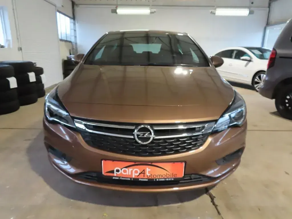 Gebraucht Opel Astra Dynamic 105 PS (77 kW) 2016 Soft bronze Limousine