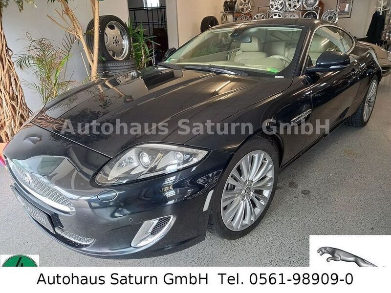 Schwarz metallic Gebraucht 2011 Jaguar XK Coupé | 31.500 € - Bild 1/4