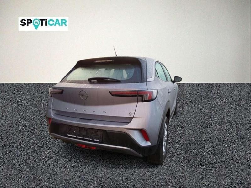 Gebraucht Opel Mokka-e Edition 100 kW (136 PS) 2021 Kontrast grau/quarz silber SUV