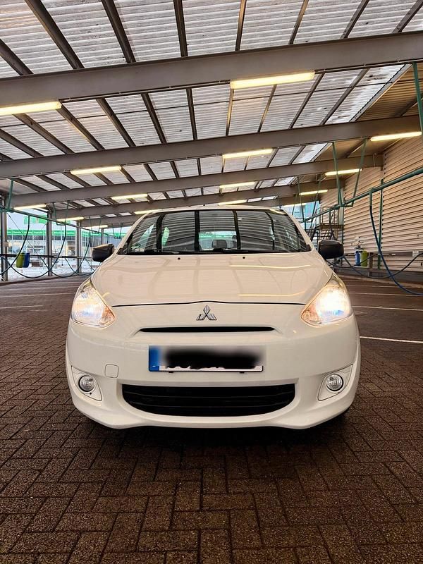 Weiß Gebraucht 2015 Mitsubishi Space Star Kleinwagen | 6.799 € - Bild 1/4
