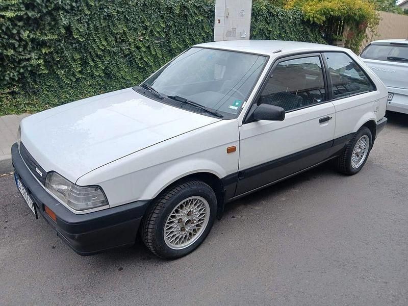 Weiß Gebraucht 1988 Mazda 323 Coupé | 19.900 € - Bild 1/4