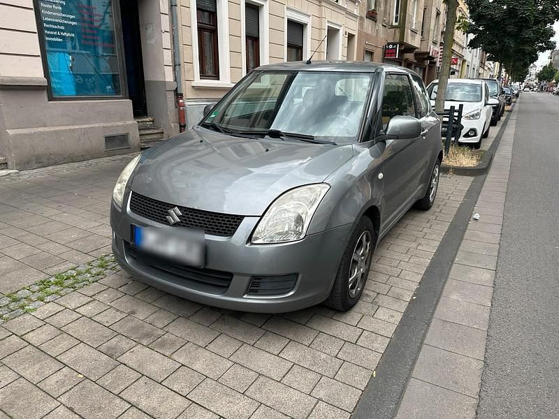 Grau Gebraucht 2008 Suzuki Swift Kleinwagen | 1.850 € - Bild 1/4