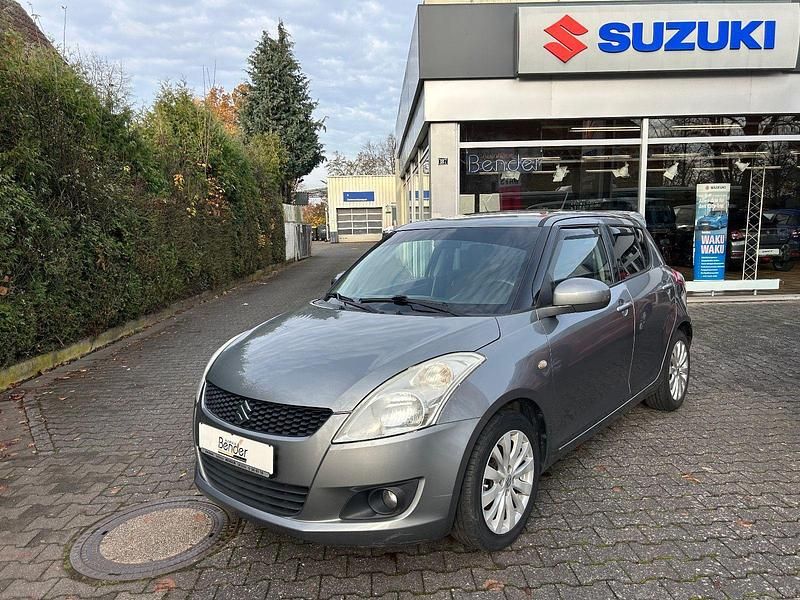 Grau Gebraucht 2012 Suzuki Swift Comfort Kleinwagen | 5.900 € (Fairer Preis) - Bild 1/4