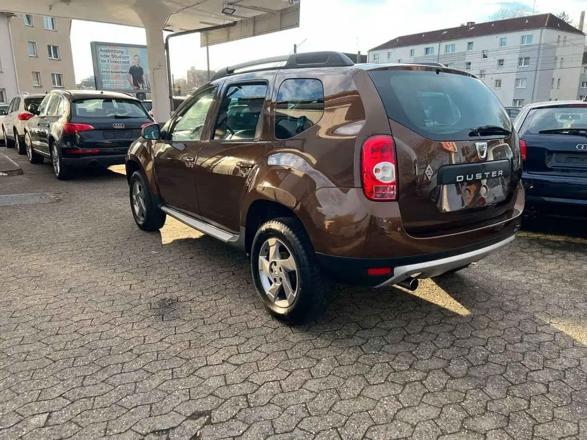 Używany Dacia Duster Prestige 105 KM (77 kW) 2012 Brązowy Minivan