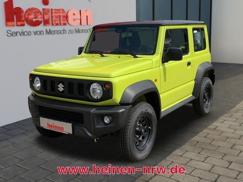 Kinetic / bluish black Neu 2024 Suzuki Jimny Comfort SUV | 28.480 € - Bild 1/4