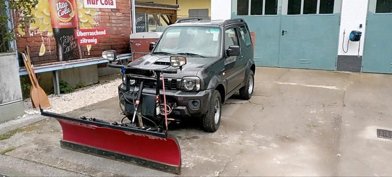 Grau Gebraucht 2013 Suzuki Jimny SUV | 15.700 € (Teuer) - Bild 1/4