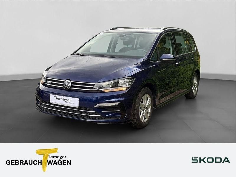 Blau Gebraucht 2024 VW Touran R-line Van / Kleinbus | 36.420 € (Fairer Preis) - Bild 1/4