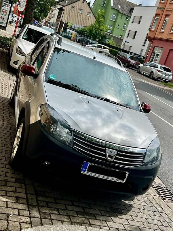 Grau Gebraucht 2009 Dacia Sandero Stepway Kleinwagen | 1.400 € (Superpreis) - Bild 1/4