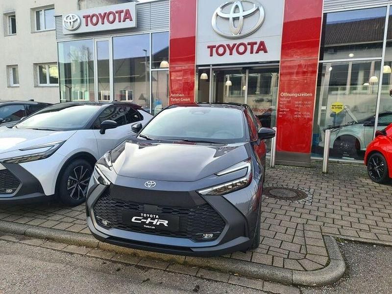 Grau Gebraucht 2024 Toyota C-HR Team SUV | 35.800 € (Teuer) - Bild 1/4