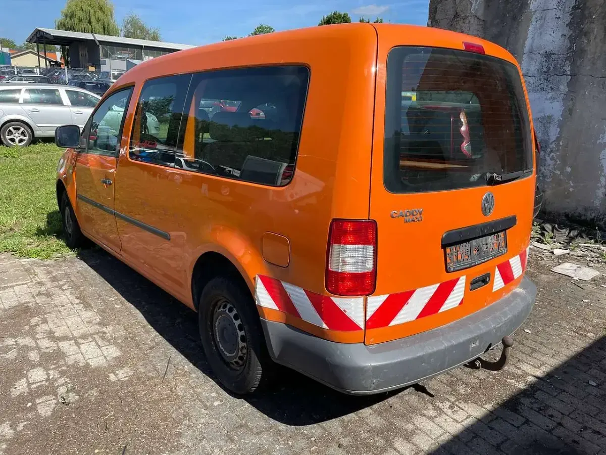 Gebraucht VW Caddy 105 PS (77 kW) 2009 Leuchtorange Van / Kleinbus