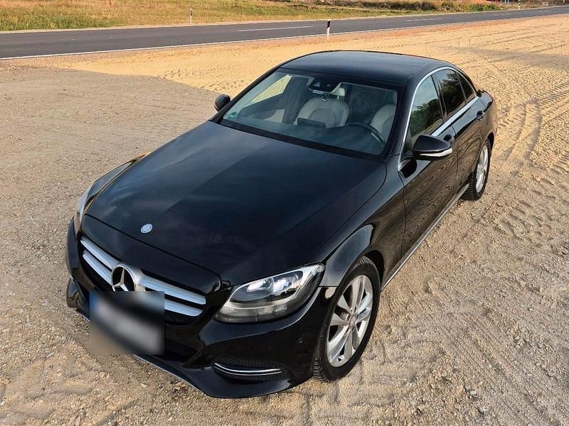 Schwarz Gebraucht 2014 Mercedes C200 Limousine | 11.500 € - Bild 1/4