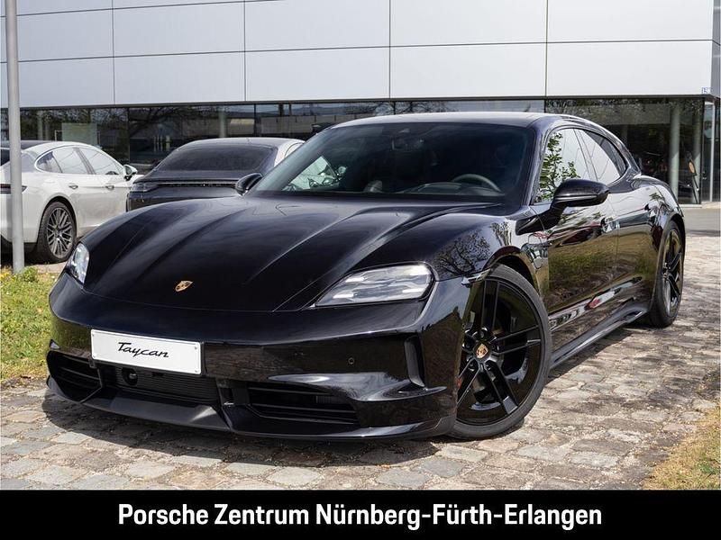 Tiefschwarzmetallic Gebraucht 2024 Porsche Taycan 4S Sport Turismo Limousine | 162.990 € - Bild 1/4