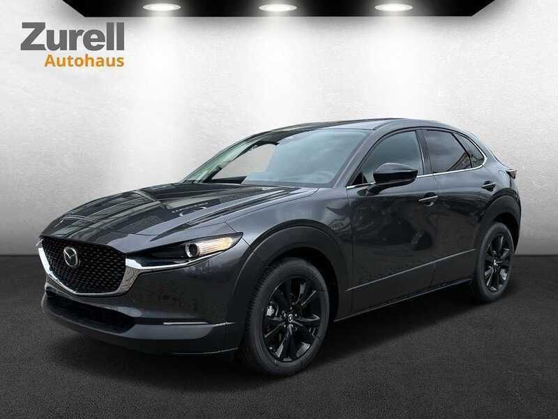 Machine gray Neu 2024 Mazda CX-30 Homura-Line SUV | 28.444 € - Bild 1/4