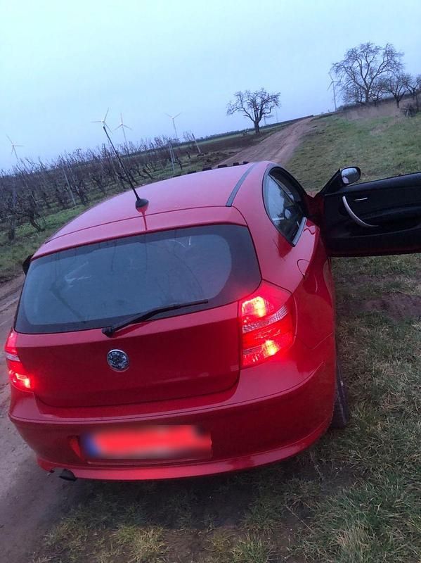 Second-hand BMW 116 122 CP (89 kW) 2011 Roșu Hatchback