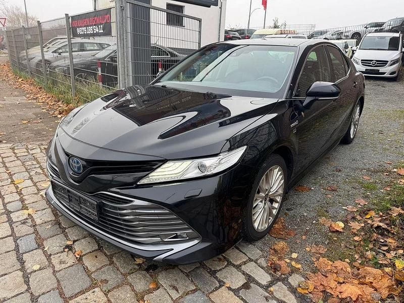 Schwarz Gebraucht 2020 Toyota Camry Hybrid Executive Limousine | 15.600 € - Bild 1/4