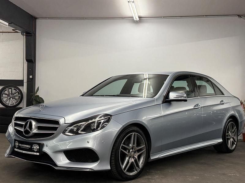 Silber Gebraucht 2014 Mercedes E300 AMG line Limousine | 17.990 € - Bild 1/4