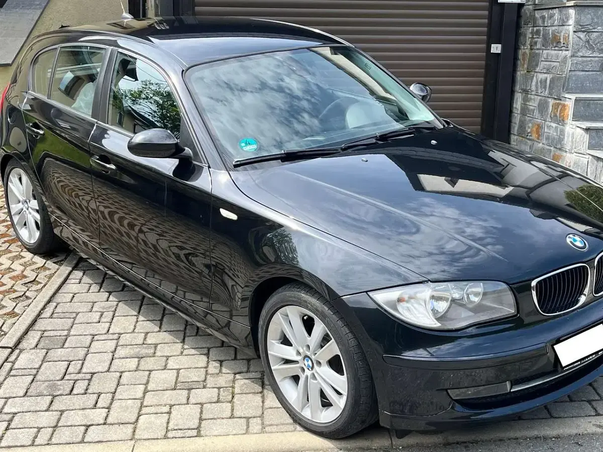 Używany BMW 116 122 KM (89 kW) 2009 Czarny Hatchback