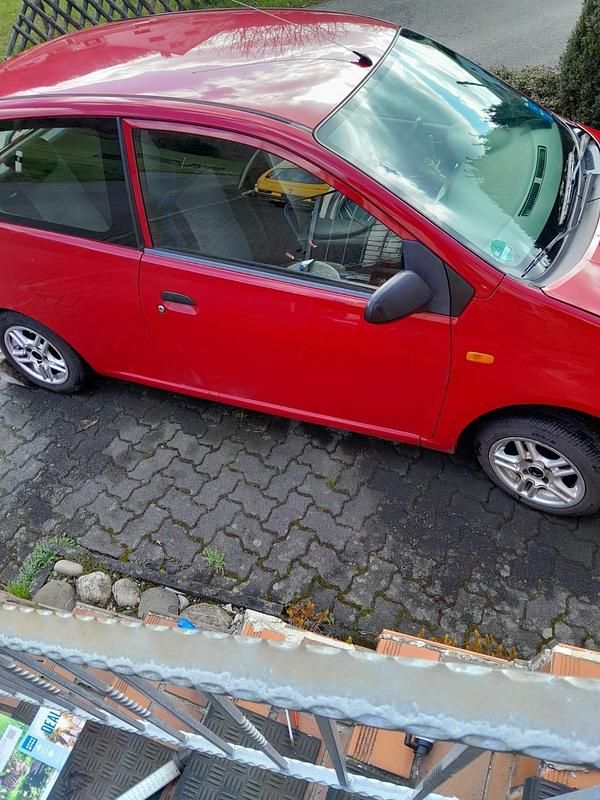 Gebraucht Daihatsu Cuore 58 PS (42 kW) 2006 Rot Kleinwagen