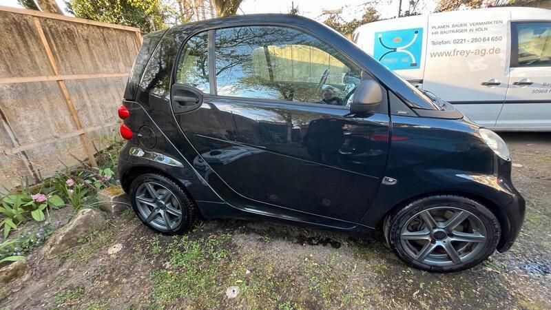 Schwarz Gebraucht 2010 Smart ForTwo Coupé Kleinwagen | 4.300 € - Bild 1/4