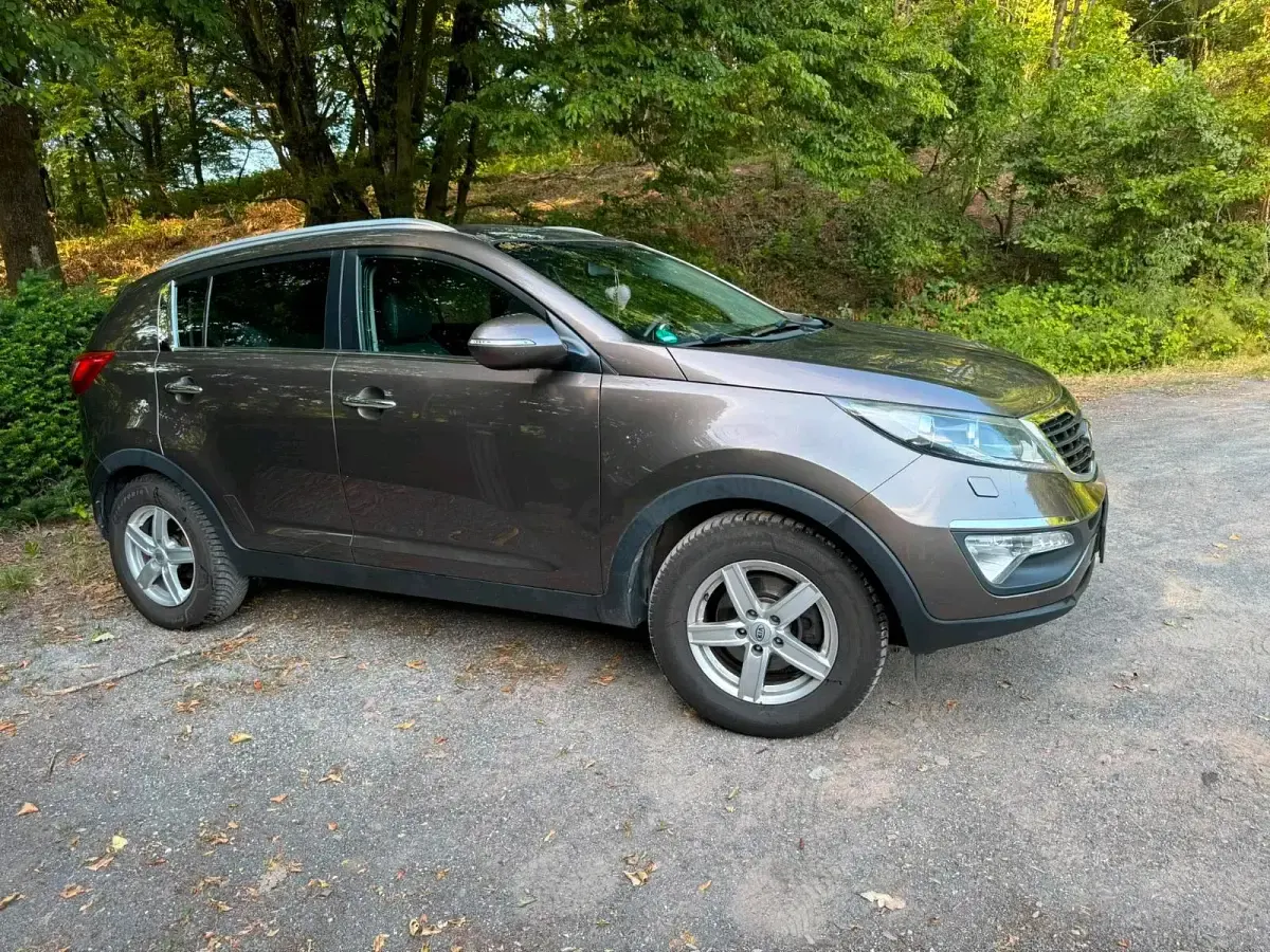 Gebraucht Kia Sportage 116 PS (85 kW) 2013 Braun SUV