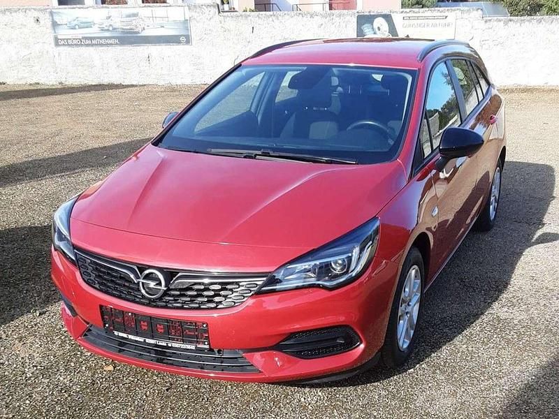 Chili rot Gebraucht 2021 Opel Astra Edition Kombi | 12.699 € (Fairer Preis) - Bild 1/4