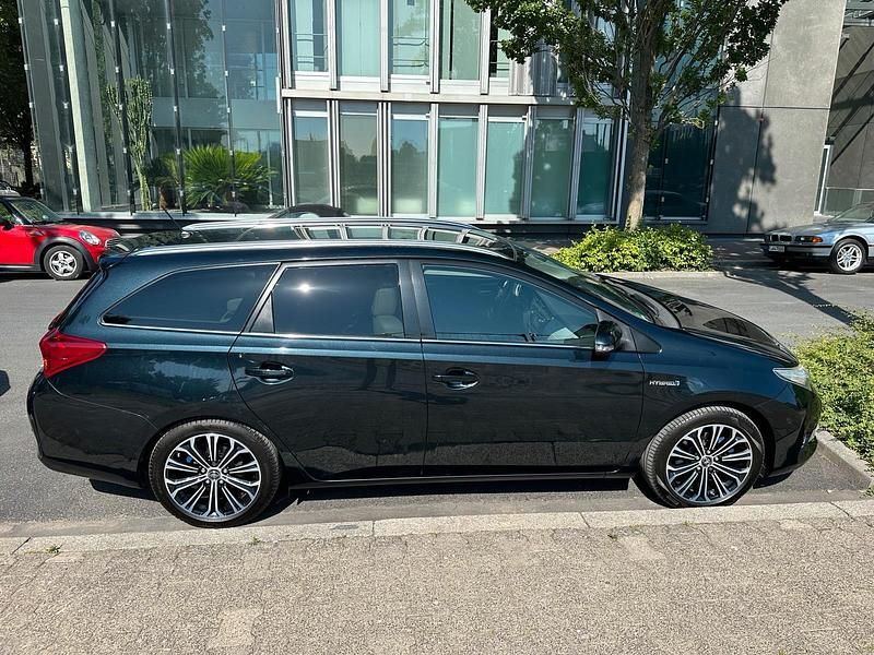 Gebraucht Toyota Auris Hybrid 100 PS (73 kW) 2014 Blau Kombi