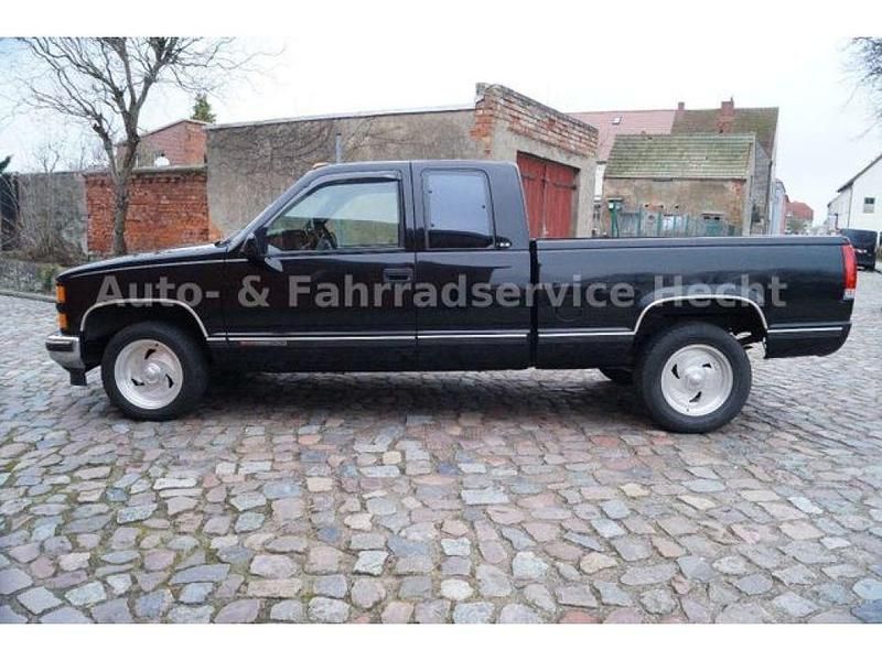 Second-hand GMC Sierra 182 CP (133 kW) 1998 Negru Pickup
