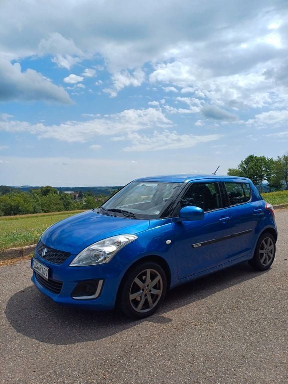 Blau Gebraucht 2015 Suzuki Swift Club Limousine | 5.299 € (Fairer Preis) - Bild 1/4