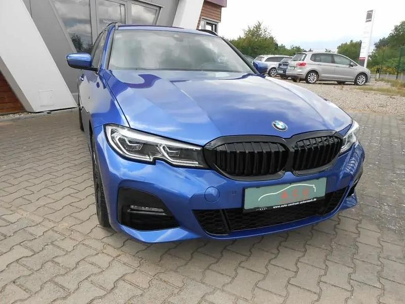 Portimao blau metallic Gebraucht 2020 BMW 320 M Sport Kombi | 47.990 € - Bild 1/4