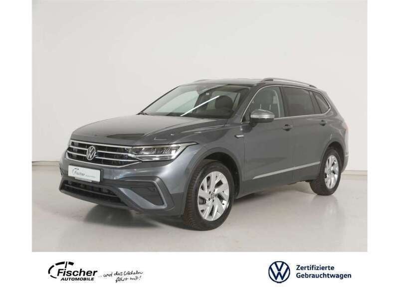 Grau Gebraucht 2024 VW Tiguan Allspace Life SUV | 34.740 € (Superpreis) - Bild 1/3