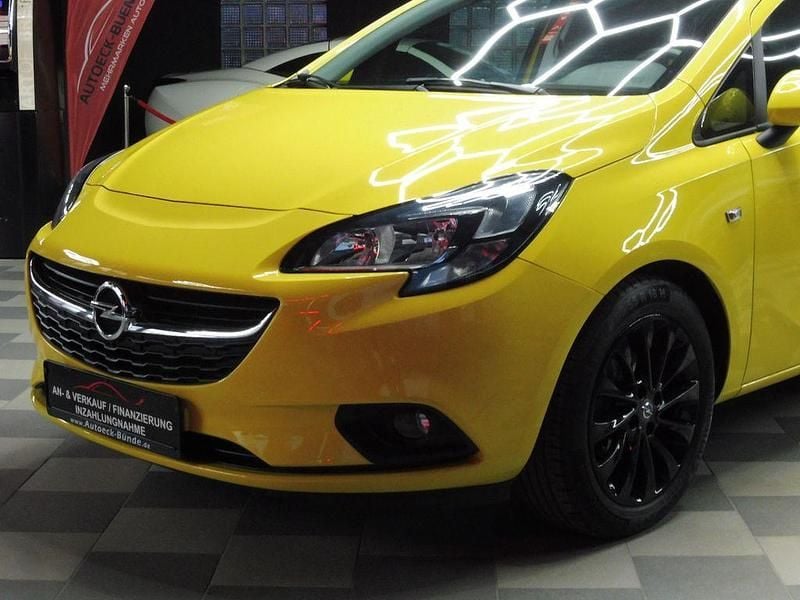 Gelb Gebraucht 2015 Opel Corsa drive Kleinwagen | 7.799 € (Guter Preis) - Bild 1/4