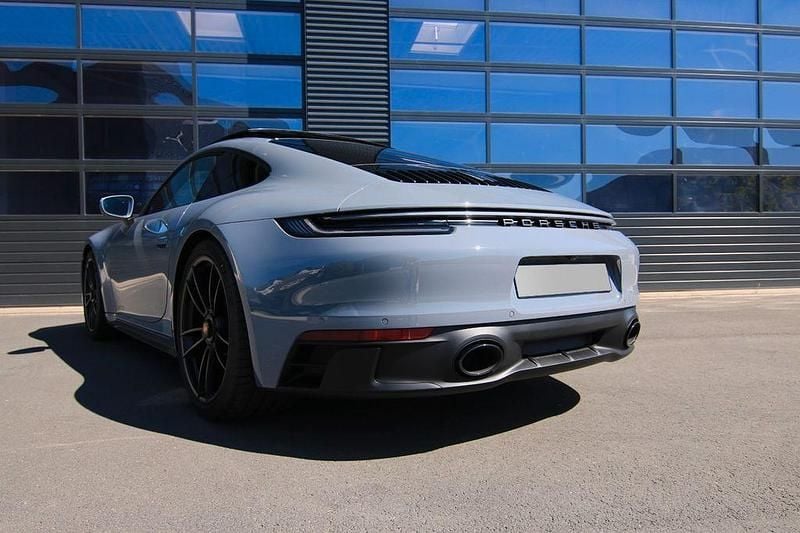 Grau Gebraucht 2023 Porsche 911 Carrera 4 GTS | 165.911 € (Teuer) - Bild 1/4