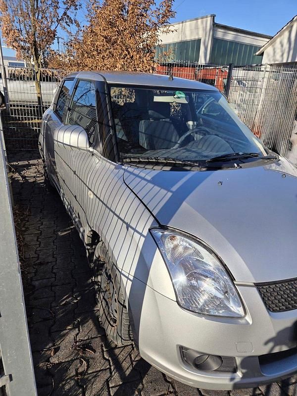 Gebraucht Suzuki Swift 68 PS (50 kW) 2009 Silber Kleinwagen