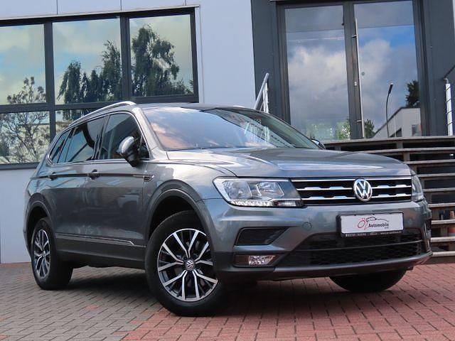Grau Gebraucht 2019 VW Tiguan Allspace Comfortline SUV | 16.900 € - Bild 1/4