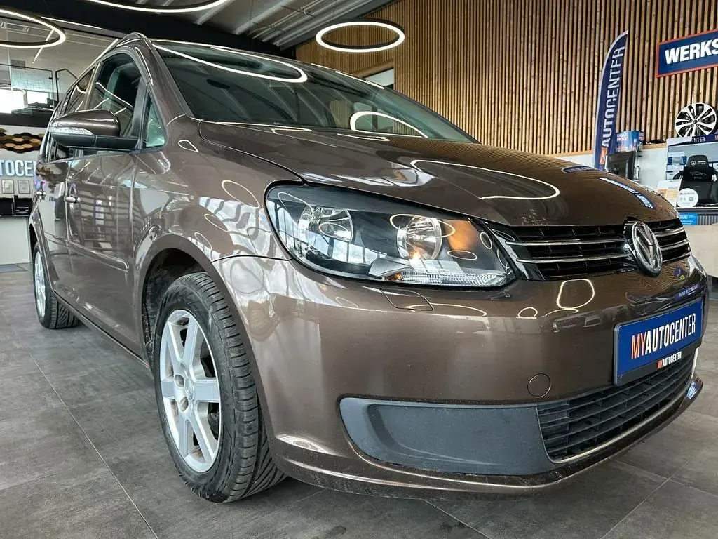 Używany VW Touran 105 KM (77 kW) 2012 Brązowy Minivan