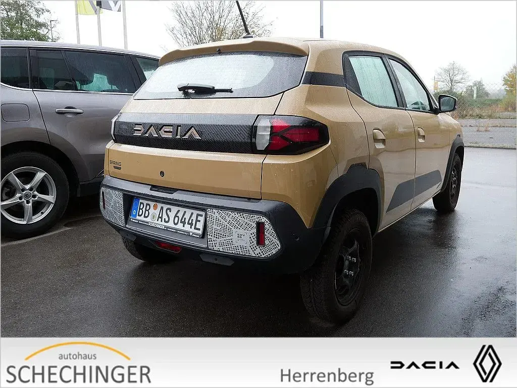Gebraucht Dacia Spring 19 kW (26 PS) 2024 Beige Kleinwagen