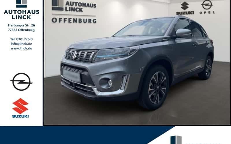 Grau Gebraucht 2024 Suzuki Vitara Comfort+ SUV | 25.988 € (Fairer Preis) - Bild 1/4
